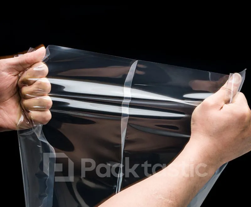 Clear polyester vacuum bags for sealing and storing fresh or frozen food products.